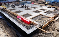 Construction of concrete foundation of building from a wide angle