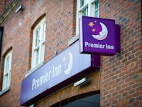 Premier Inn hotel sign on hotel in London