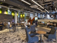Percy Gee restaurant area with students sat enjoying drinks and food