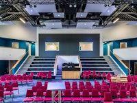 Locks Heath Free Church interior empty auditorium with red seats